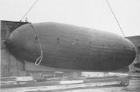 8:00 a.m. ..the Tym-Barge being loaded on a flatbed truck at 1215 Belmont Avenue for its trip thru the Chicago River and sea trials.